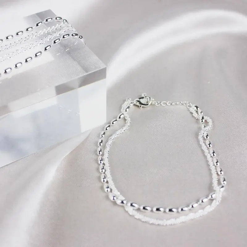 Elegant Silver Bracelet with Zirconia Stones