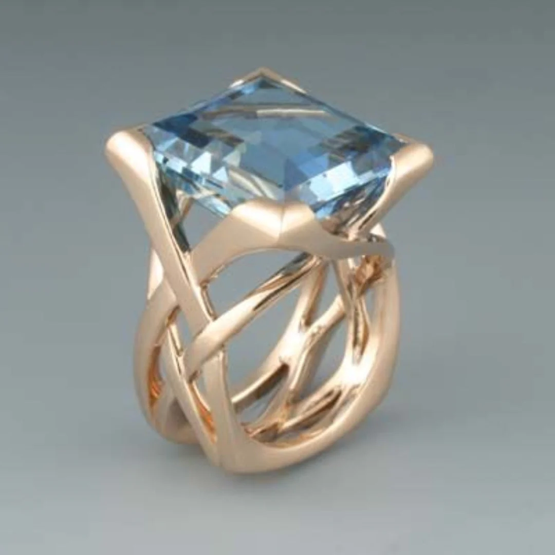 Timeless Rose Gold Ring with Blue Zirconia